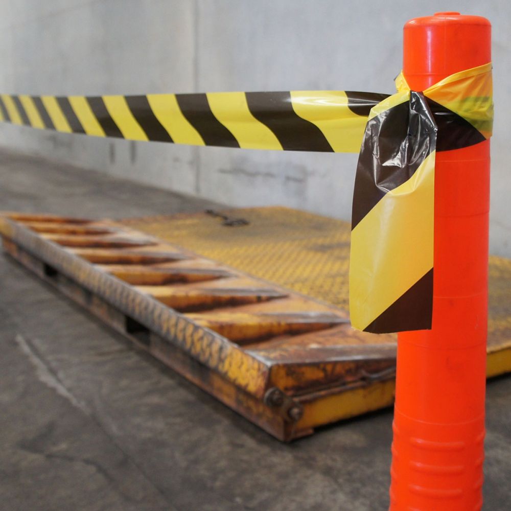 Black and yellow barrier tape 75mm x 100m — warehouse hazard tape — SafeMark Supplies