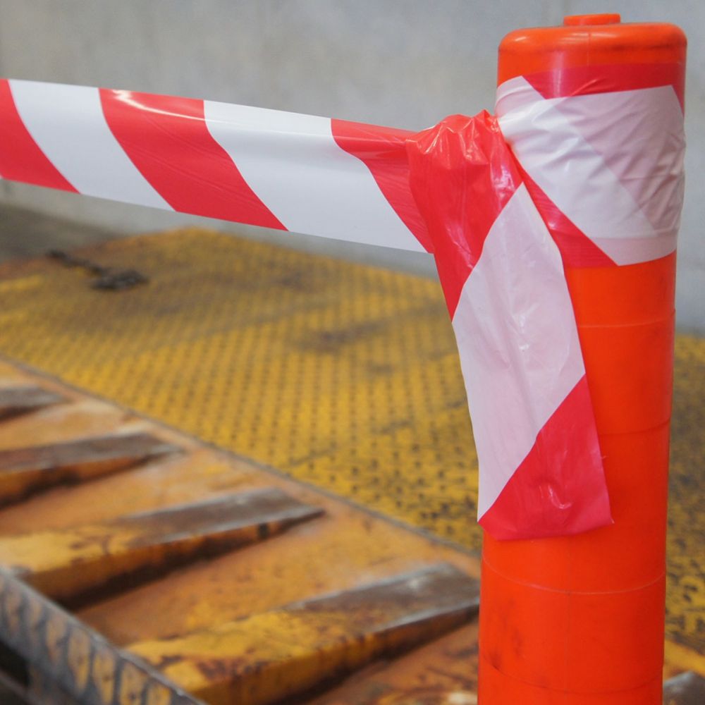 Red and white barrier tape 75mm x 100m — warehouse hazard tape — SafeMark Supplies