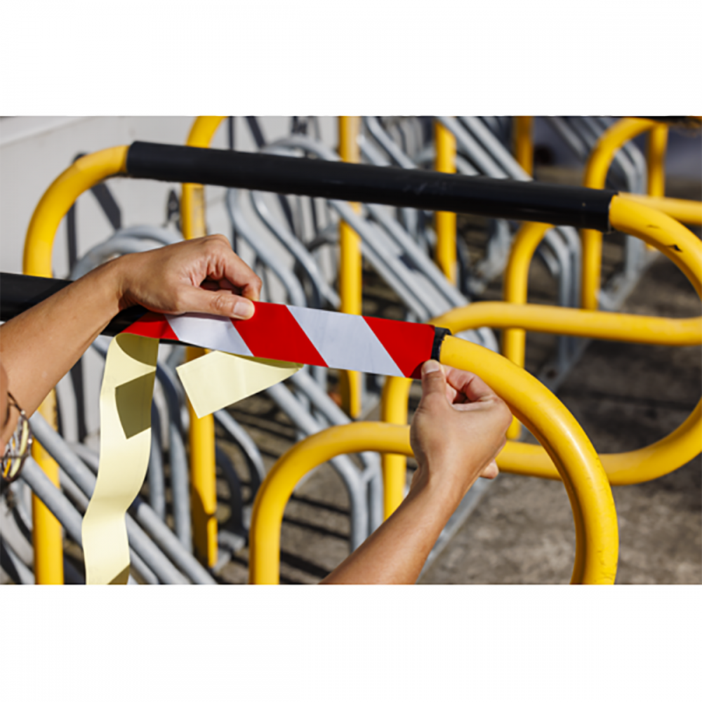 Red and white reflective warning tape 50mm x 50m Class 100 — warehouse safety — SafeMark Supplies